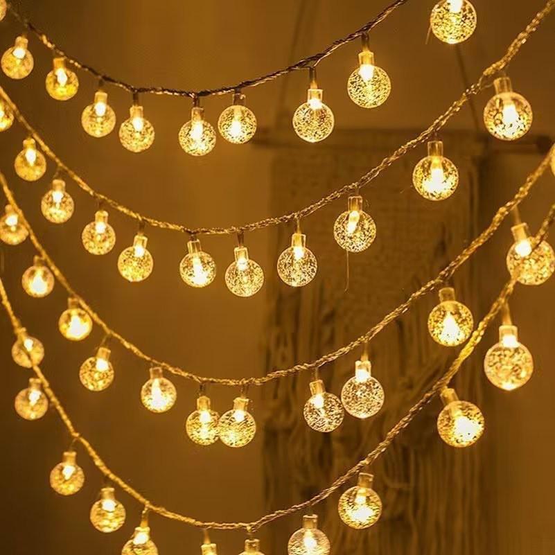 LED Solar Bubble Ball String Lights - Outdoor Waterproof Decorative Colored Star Lights for Courtyard and Camping Ambiance.
