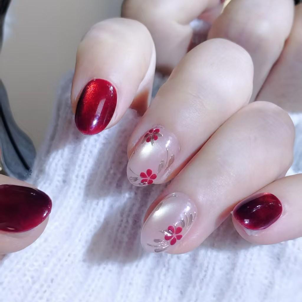 New Year Ruby Cat Eye Press-On Nails: Hand-Painted Plum Blossom, Elegant Skin-Whitening Short Nails
