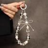 Personalisierte kreative Schleifen-Perlen-Handykette Universelles Handy Anti-Verlust-Lanyard Kurze Handy-Handschlaufe