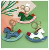 Cartoon Rocking Horse Keychain: Creative PU Leather Pony Charm with Cotton Filling.
