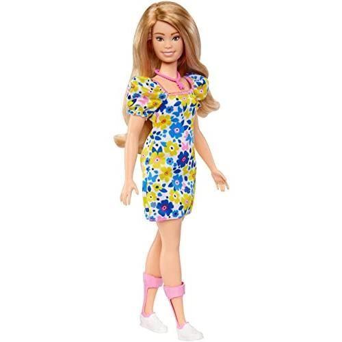 Barbie poupée fashionistas atteinte de trisomie 21 avec une robe à fle