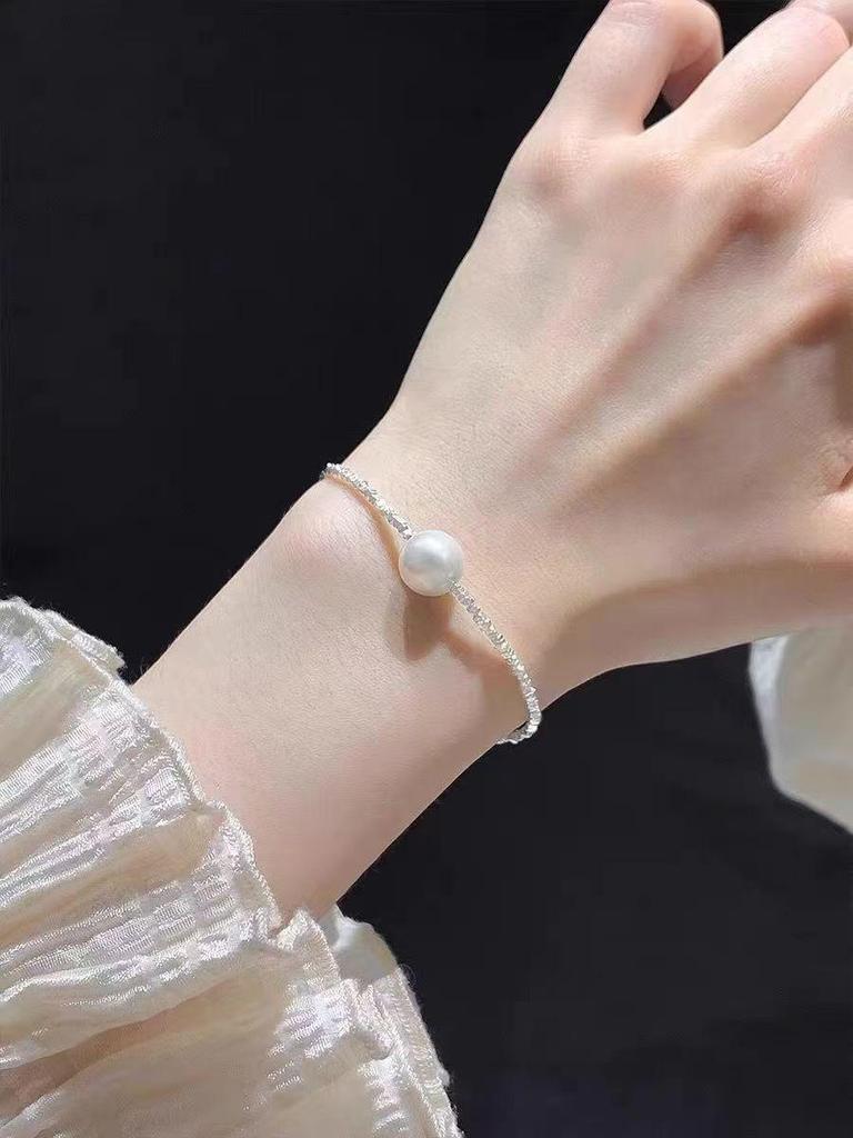 Baroque Pearl Drawstring Bracelet: Women's Light Luxury, Irregular Design, Exquisite Handcrafted Jewelry.