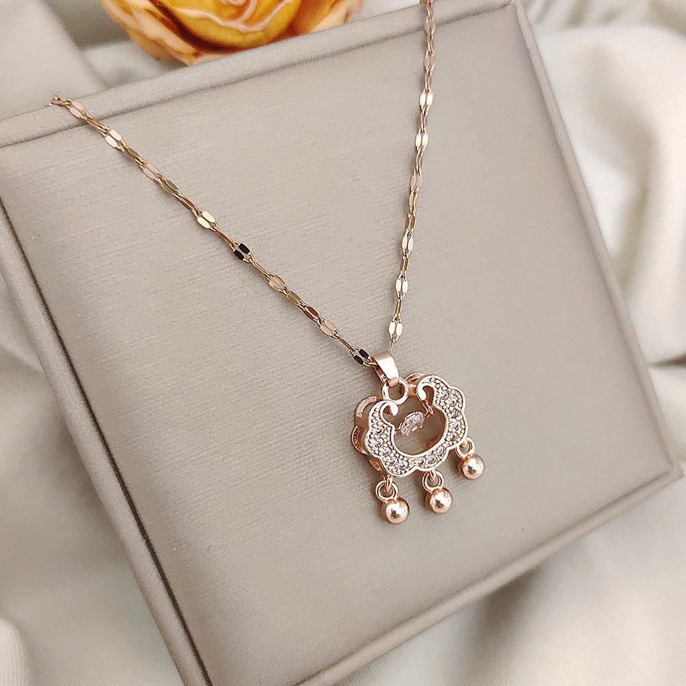 

Copper-Plated Gold Pendant with Zirconia Stones - Peace Lock Necklace, Non-Fading, Light Luxury, High-End Accessory