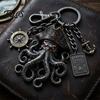 Tentacle Design Keychain Pendant with Compass Lobster Clasp Pirate Style Metal Aged Mysterious Oxidation Texture Red Eye Octopus Shape Key Ring