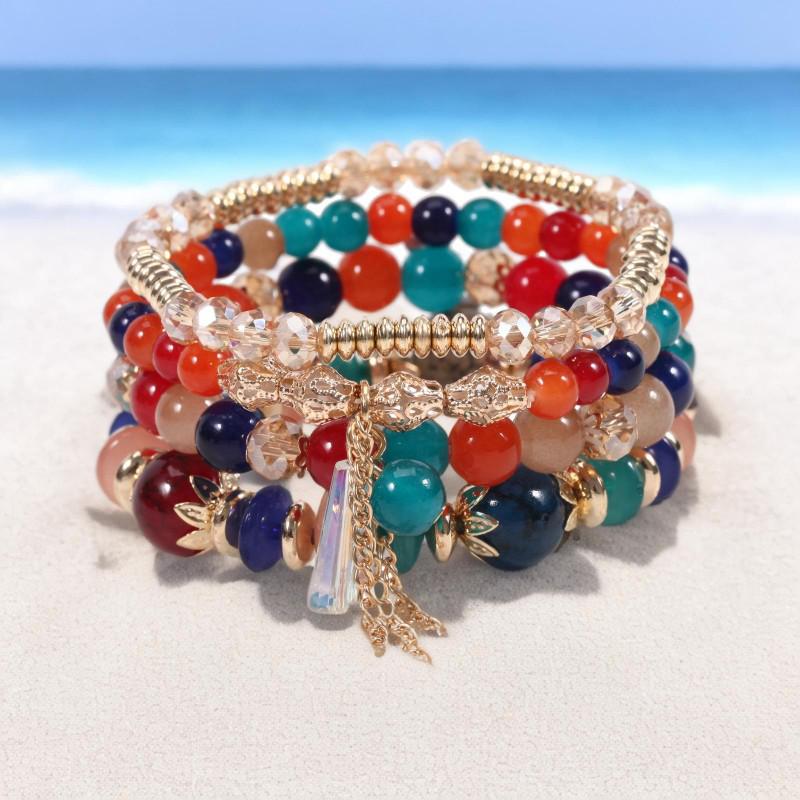 

Шикарний богемний чотиришаровий браслет з жіночою китицею з скляних намистин