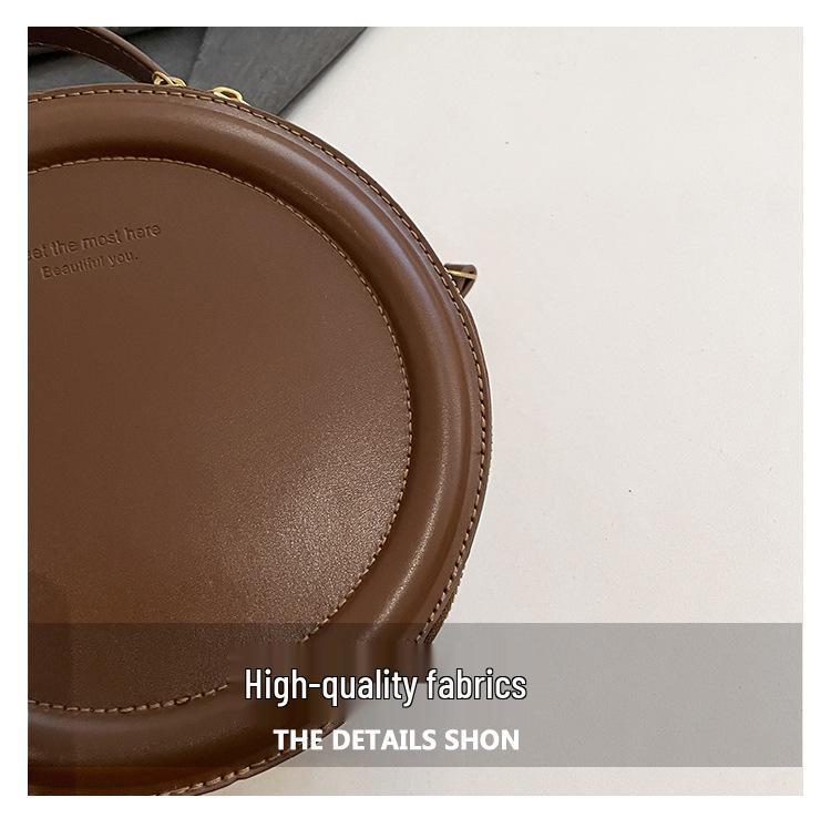 Niche Retro Hong Kong Style Women's Round Handbag - 2025 Early Spring Fashion, Versatile Single Shoulder Crossbody Bag