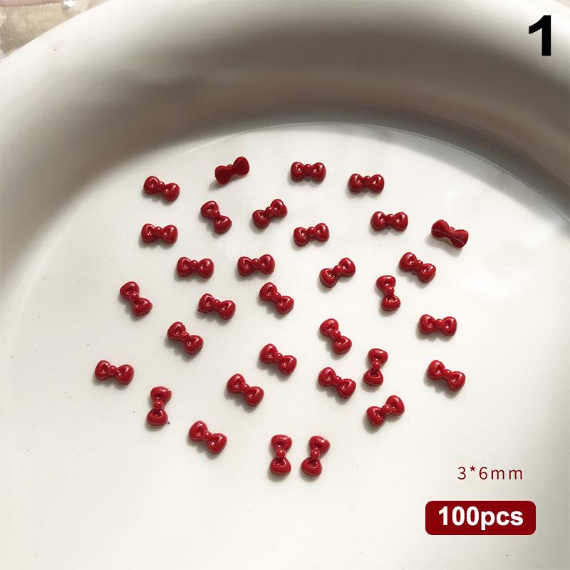 100 Stück 3D Nail Art Rote Schleifen Anhänger Kawaii Harz Zubehör für Maniküre Dekorationen 10 Stück pro Set Nail Art Zubehör