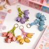 New DIY High-value Leather Tulip Car Fashionable Leather Bag Pendant Key Chains for Women Pendant Bag Charm