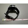 Used Nixon wristwatch, dead battery, black, no parts removed after belt adjustment
