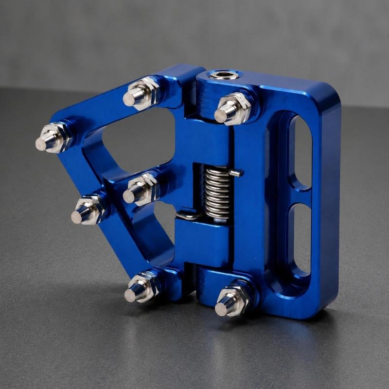 Metal-Pin Motorcycle Brake Toe Tip with Pivoting Spring Hinge, Aluminum Body, and an Elongated Slotted Attachment Section