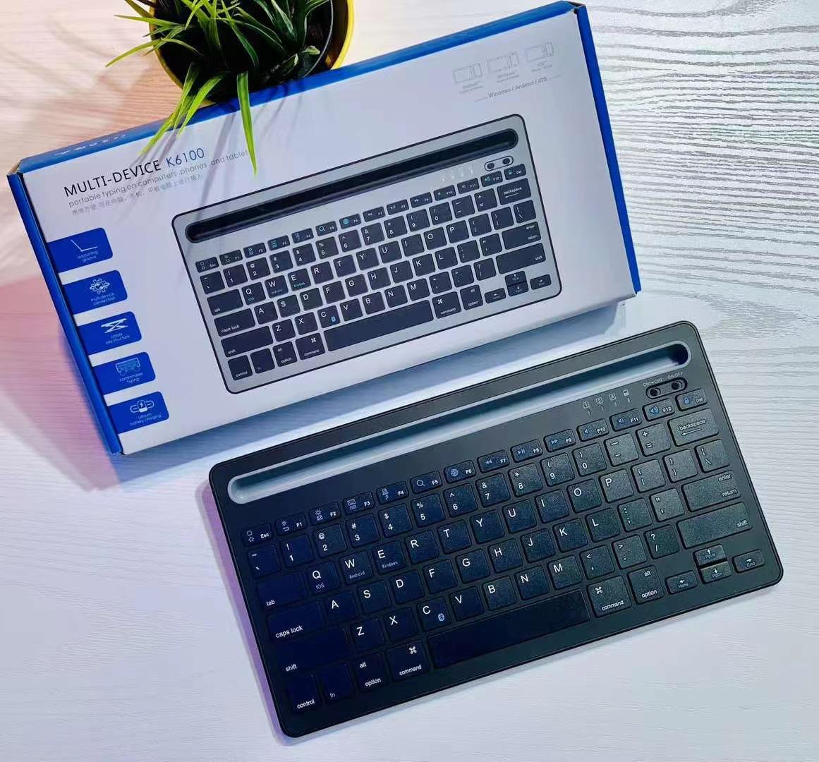 

Universal Wireless Bluetooth Keyboard with Card Slot for Tablets & Phones, Dual Channel, Three-System Compatibility