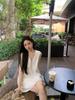 Women's Stylish V-Neck Sleeveless Summer Dress: Loose Fit, Slimming, Solid Color, Short Skirt - New Fashion Collection.