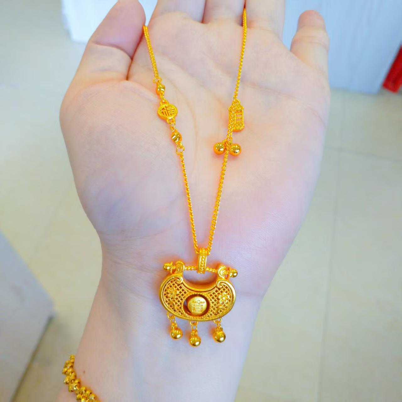 

Golden Ping An Fu Rotatable Filigree Fortune Bell Pendant Necklace