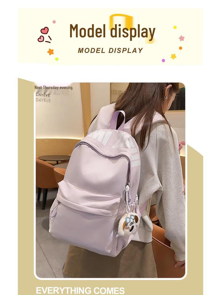 Versatile Letter Print Backpack for Students - Large Capacity for Junior High, High School, University, and Commuting.