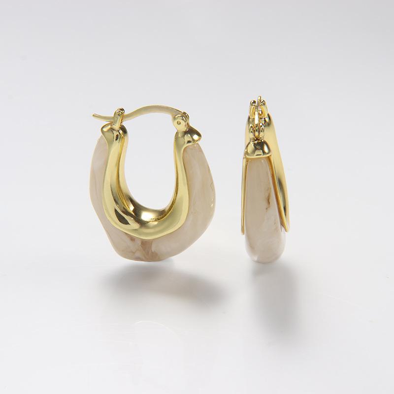 

Винтажные серьги-кольца неправильной формы с янтарной металлической текстурой Copper