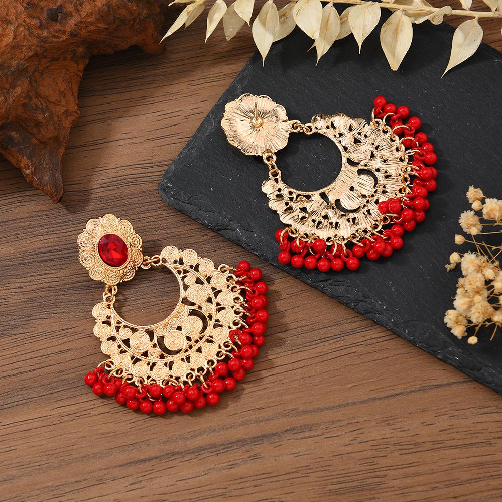 Retro Indian Alloy Rice Bead Tassel Earrings with Scenic Design