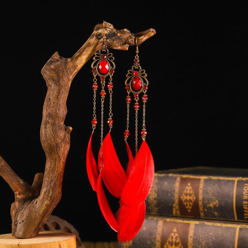 Niche design retro long fringed feather earrings femininity bohemian Yunnan vacation earrings