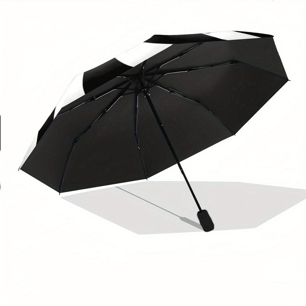 A Black And White Spiral Patterned Automatic Folding Umbrella. It Features a Portable And Collapsible Design, Making It a Casual Outdoor Acc