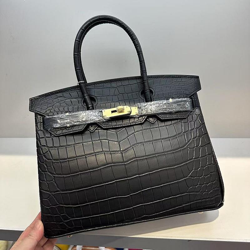 Pelle bovina primo strato motivo alligatore opaca portatile a spalla a tracolla borsa da donna premium transfrontaliera