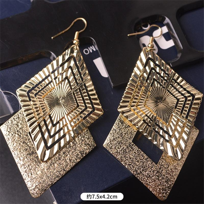 Fashion exaggerated niche temperament fringed earrings retro personality versatile sequined earrings women's long ear jewelry