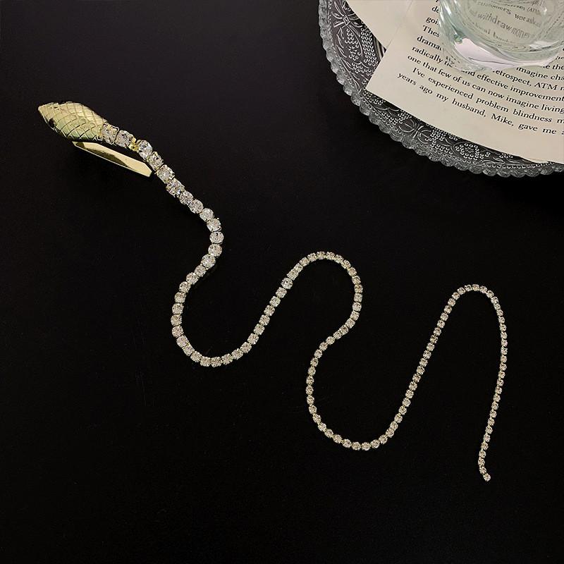 

Нова стразова змія гумка для волосся для жінок Довга китиця Кришталева пов язка на голову Аксесуари для волосся Весільні аксесуари Ювелірні вироби для волосся