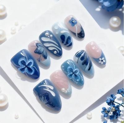 High-Quality Press-On Nails: Blue Floral Almond Fishtail with Pearl Butterfly Design - Super Shiny Cat Eye Stickers