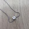 Used moschino silver necklace square dice