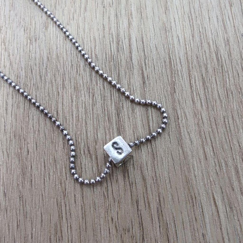 Used moschino silver necklace square dice