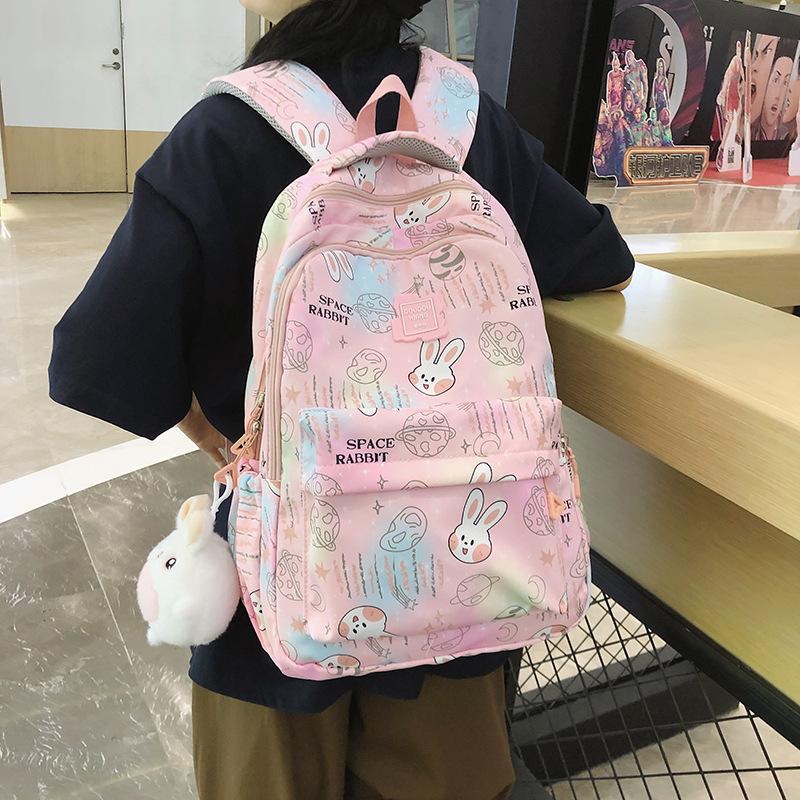 Small fresh literary printing student schoolbag spring and summer new large-capacity backpack with pendant розовый