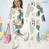 Girls Abstract Face Printed Round Neck Long Sleeve Top And Flared Pants Two Piece Outfit