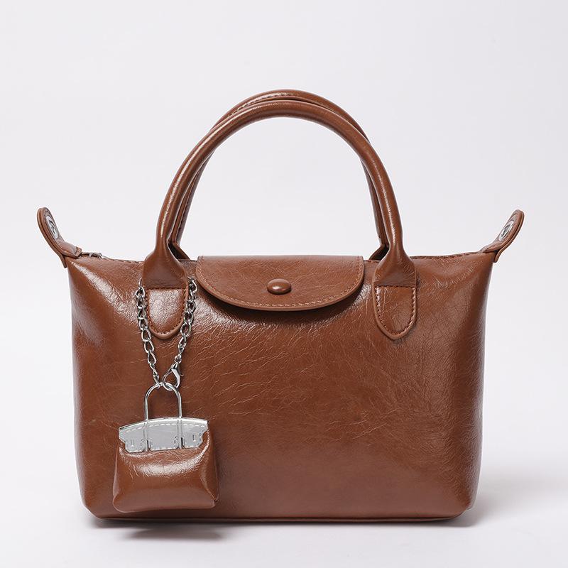 

Hand carrying small square bag women s 2025 autumn and winter new retro fashion casual shoulder bag Korean niche design women s bag No accessories коричневый