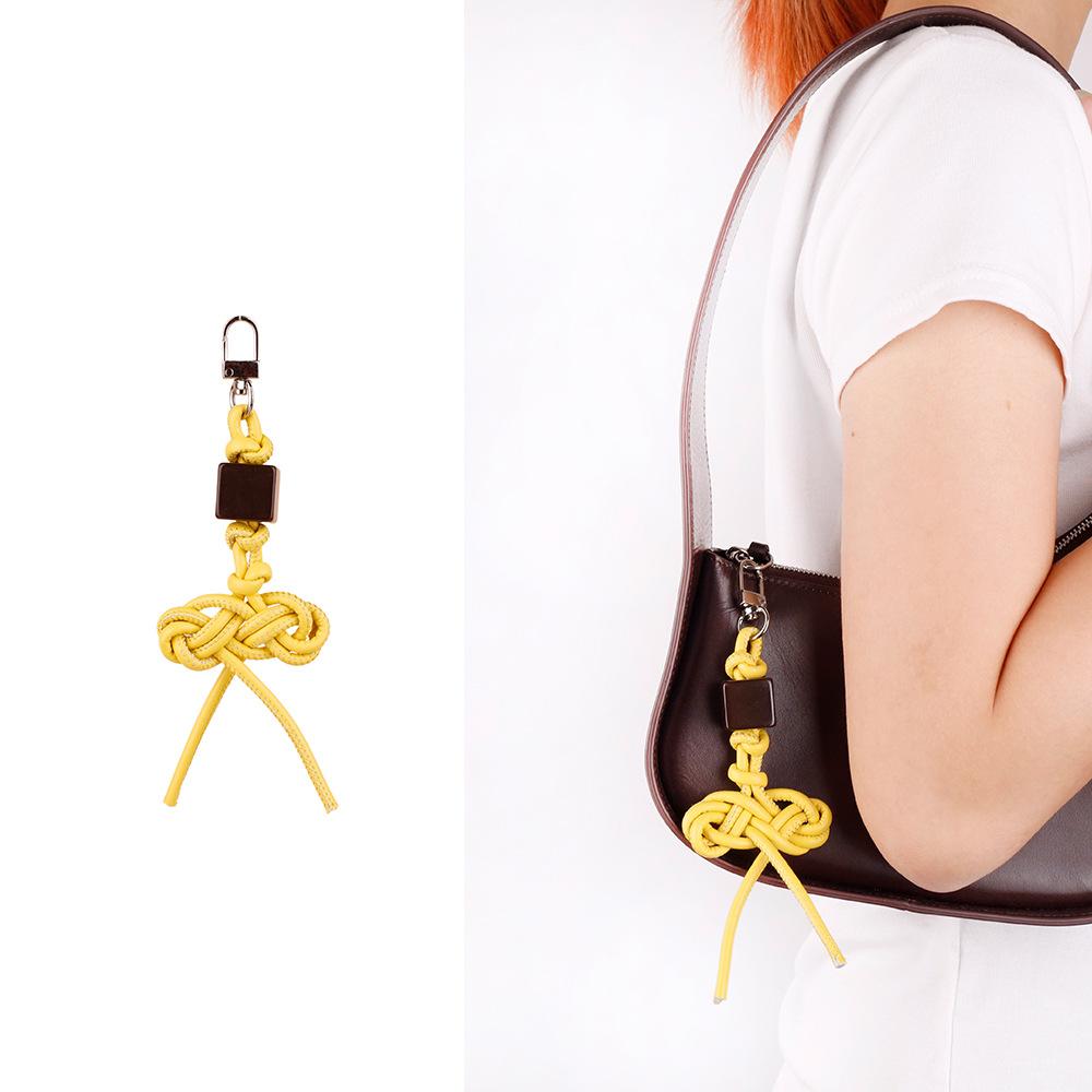 MIU series creative color hand-woven ruyi knot pu leather cord accessories bag pendant keychain