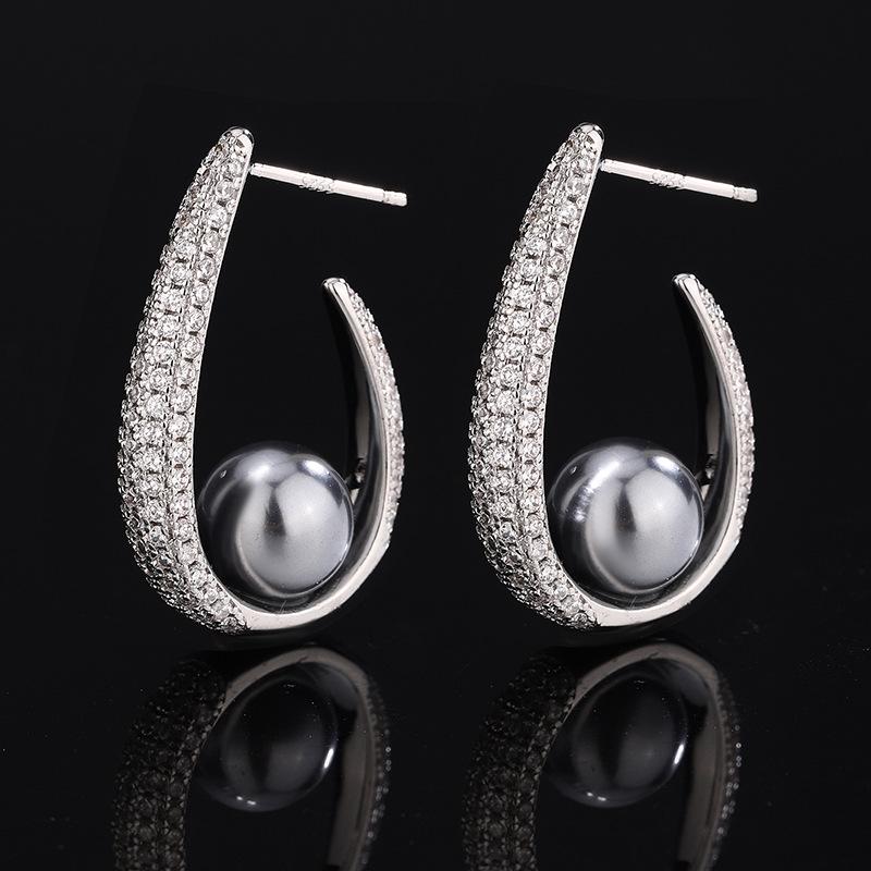 

Ювелирные изделия Серьги с жемчугом Темпераментные серьги-гвоздики с жемчугом Позолоченные серьги с жемчугом и цирконием Жемчуг