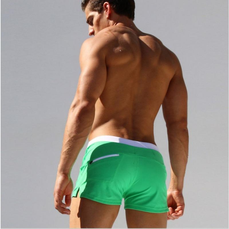 Men's solid color sexy and fashionable back pocket design, beach breathable quick-drying pants, boxer beach pants, swimming trunks.