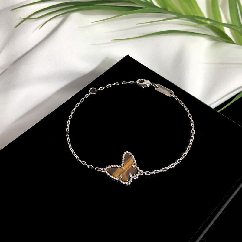 Pulseira Simples Estilo Frio INS Borboleta: Design Suave e Fresco Japonês e Coreano com Carcaça Branca para Mulheres