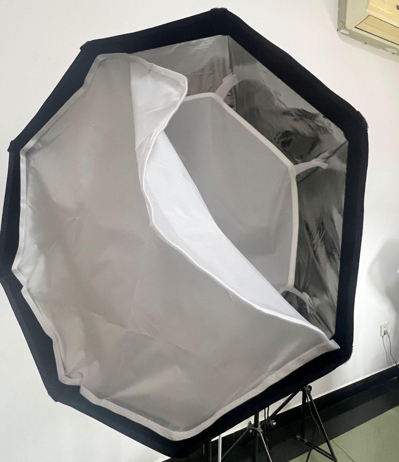 Octagonal Portable Flash Softbox with Grid for Studio Photography and Film.