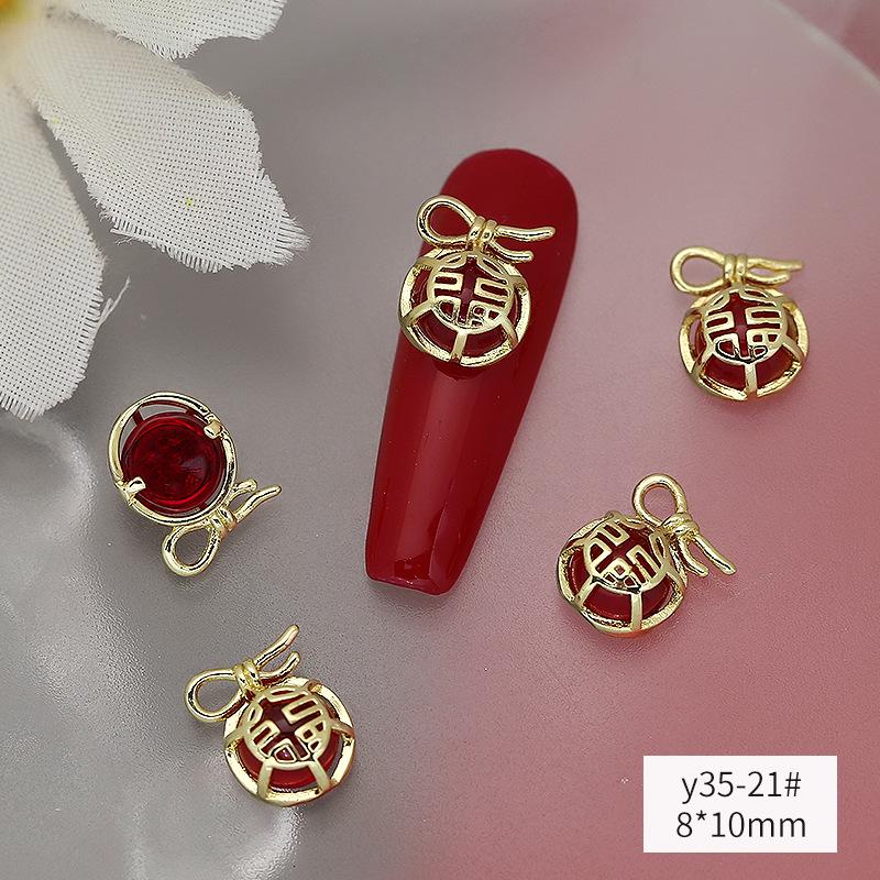 

Sparkling New Year s Zirconia Nail Art: Wealth-Attracting Money Bag, Diamond Luxury Gourd, and Gold/Silver Nail Ornaments