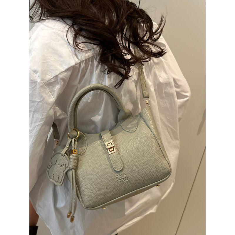 

South korea Niche Portable Vegetable Basket Bag Women Spring 2025 New Trendy Fashion Bucket Bag All-Matching Ins Messenger Bag Black