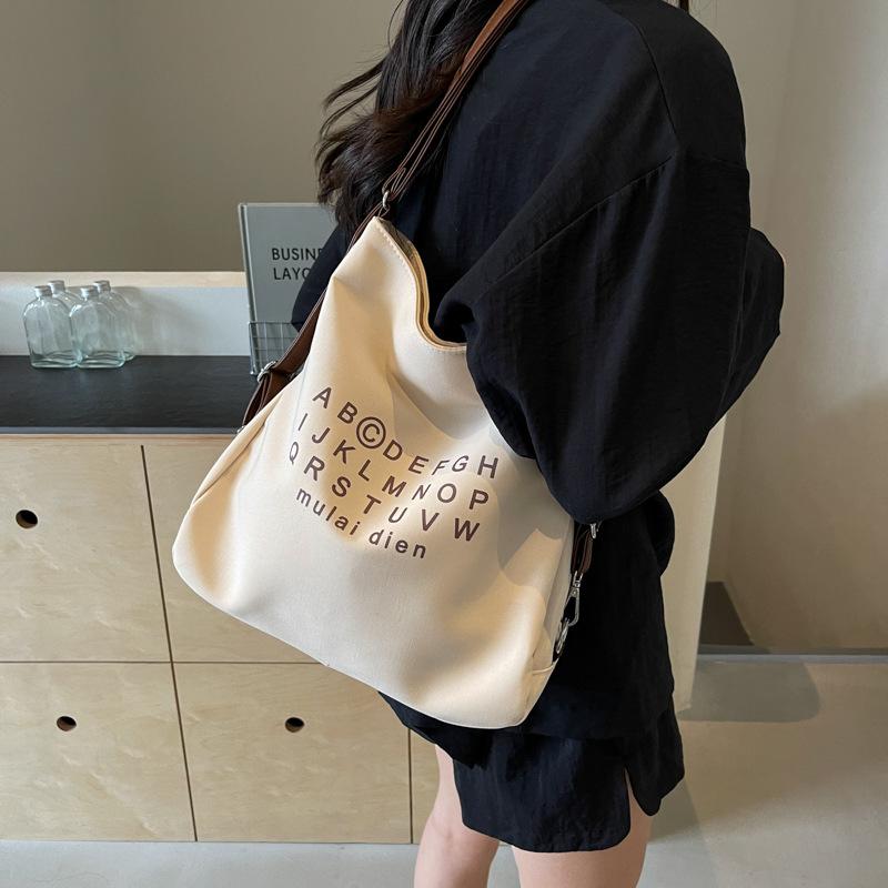 Autumn new canvas large-capacity bag women's 2025 fashion messenger bag fashion texture commuter shoulder tote bag