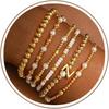 Turandoss 18K Gold Plated Beaded Stretch Initial Bracelet for Women Gifts