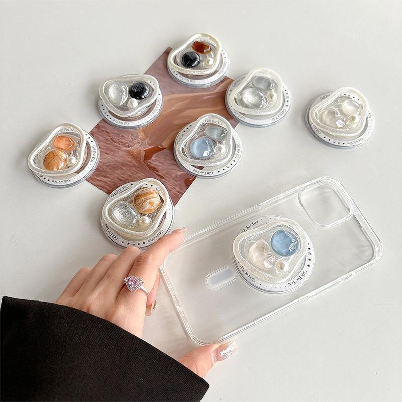 Xiaoqing Fresh Air Mobile Phone Airbag Holder Magnetic Suction Retractable Jewel Pearl Light Luxury Desktop Lazy Watching Drama