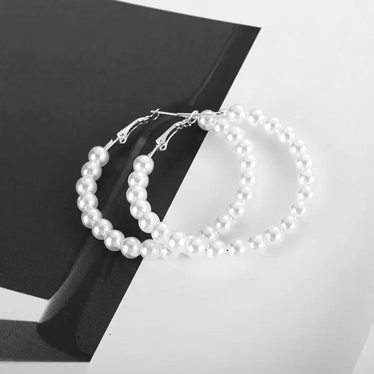 Korean fashion high-end earrings, simple design round earrings, creative light luxury cold wind temperament earrings