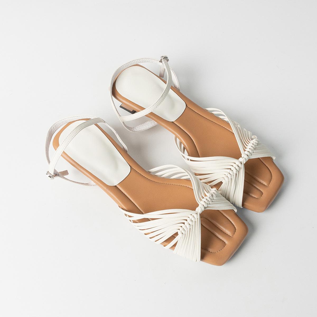 

Sheepskin version~ French woven hollow holiday sandals women s low heel comfortable word with square head temperament high heels 34