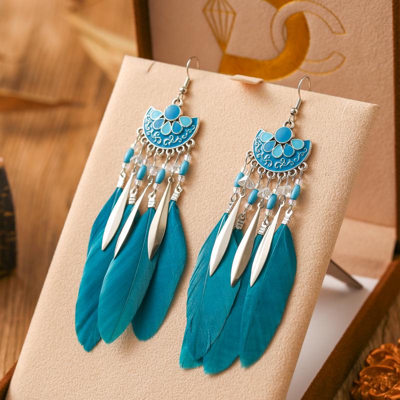 Neuer Drop Oil Fächerförmiger Federohrring für Damen Mode Bohemian Langer Silberfarbener Metall Reiskorn Hänger Ohrring Schmuck