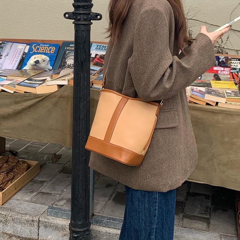 

New Design Autumn and Winter Classic Fashionable Simple Texture Quality Splicing Bucket Bag Versatile One-shoulder Crossbody Bag for Women