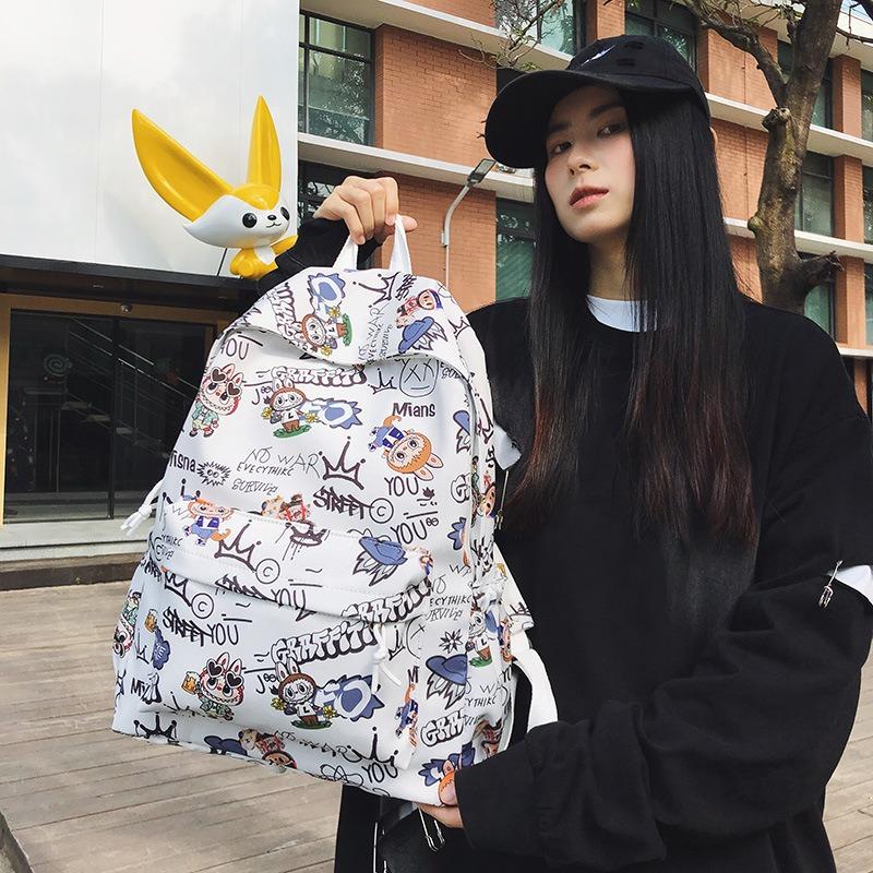 New backpack male junior high school student schoolbag fashionable new female backpack travel backpack