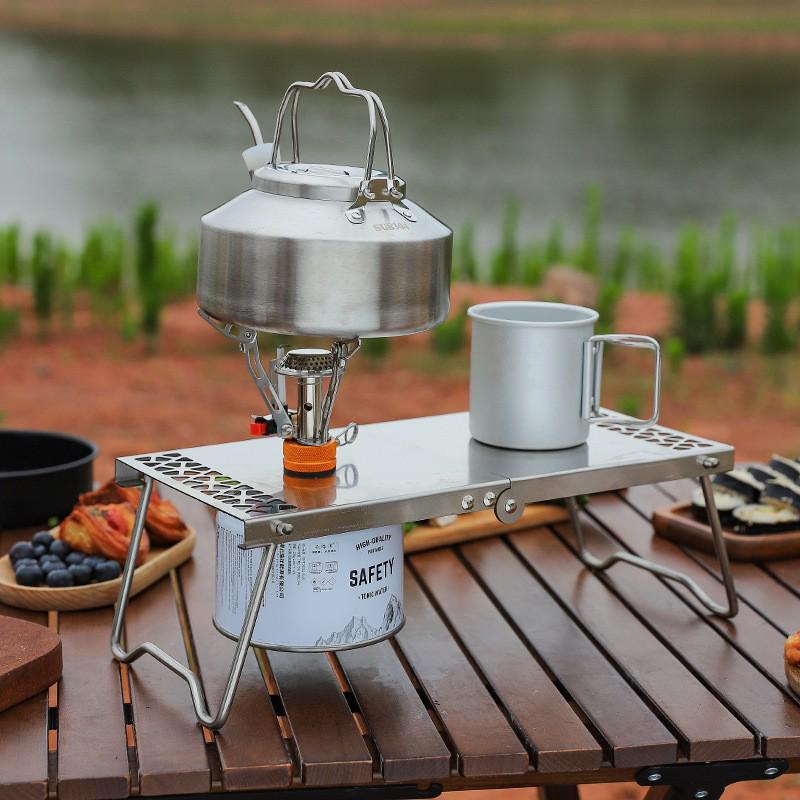 Stainless Steel Portable Folding Table: Multi-functional Tea, Picnic, Camping, Hiking, and BBQ Table with Gas Stove Compatibility.