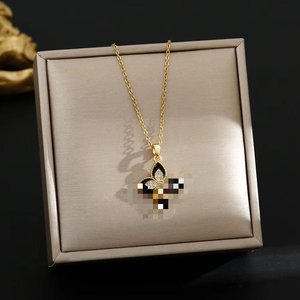 Elegant Gold-Plated Chinese-Style Four-Leaf Clover Necklace with Imitation Hetian Jade Pendant for Women