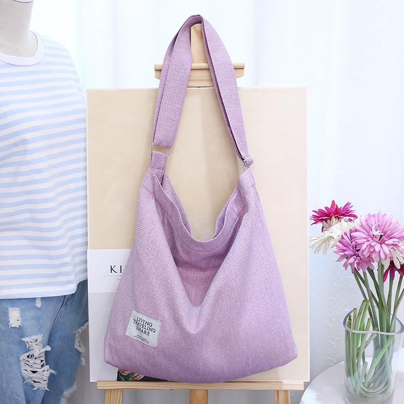 

New Korean version simple women s shoulder bag canvas retro casual women s bag messenger bag large capacity canvas bag supply рожевий