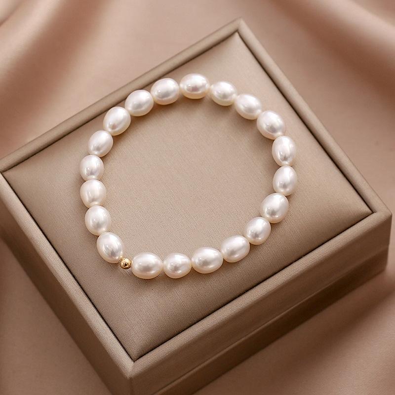 Rice Grain Freshwater Pearl Bracelet Temperament Niche Design Fashionable And Simple 18K Gold Electroplating Bracelet Elastic Adjustable